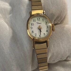 Vintage gold Timex watch , stretch band